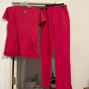 Hot pink scrub set size XS for both top and bottom.